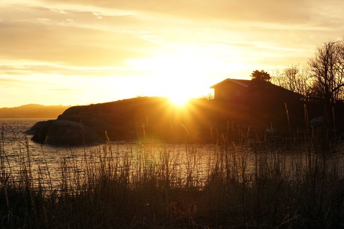 Peaceful seashore lake at sunset