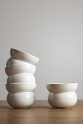 Two stacks of coffee cups