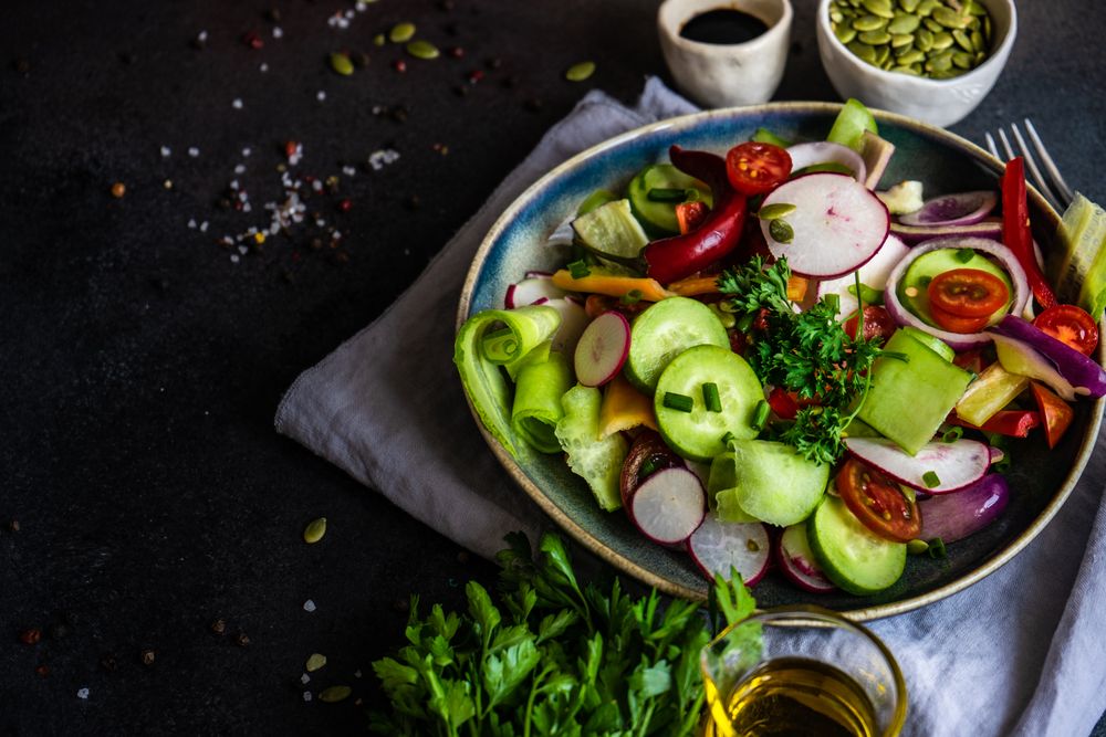 Raw salad with freshly chopped vegetables