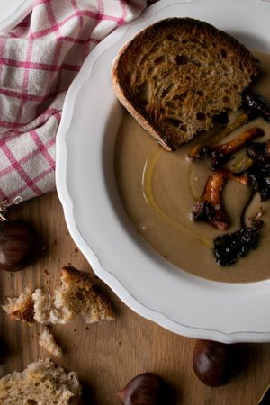 Bread and scallion near chestnut soup