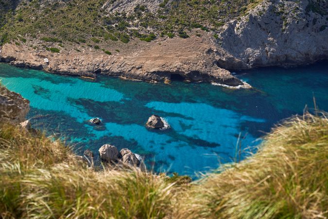Turquoise bright blue water amidst land