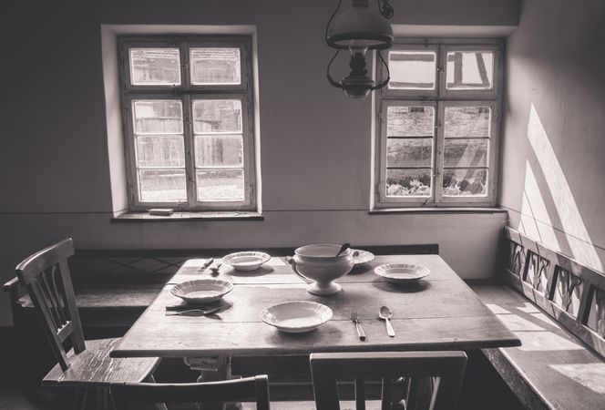 Vintage dining room with rustic dishes and tableware