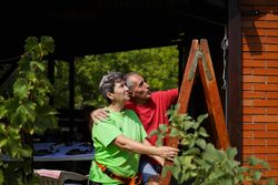 Happy mature couple renovating their house.