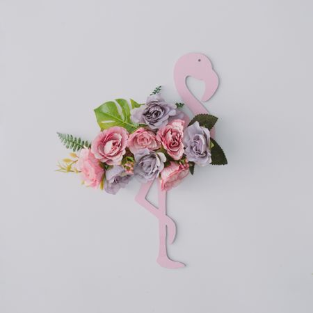 Pink flamingo with flowers