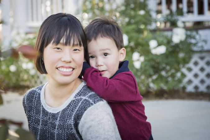 Chinese Mother Having Fun with Her Baby Son