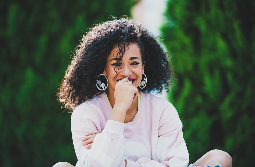 Portrait of modern Black woman with curls