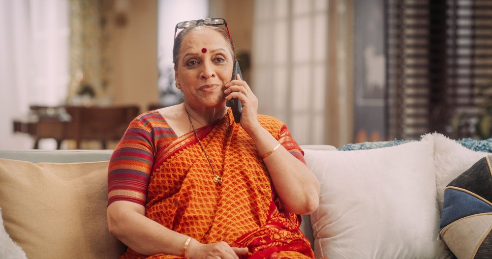 Mature Woman Using Phone, Calling and Talking