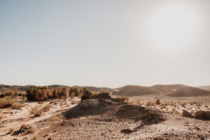 Sunset sky over hills in desert