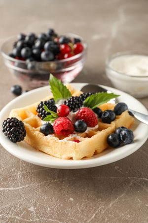 Composition of breakfast with belgian waffles, space for text