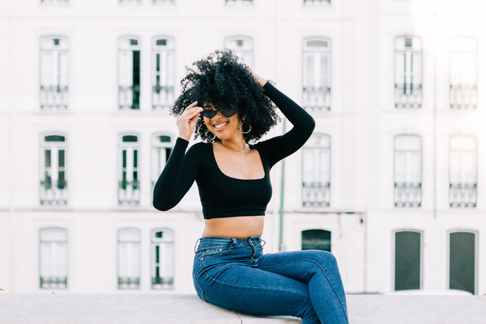 Fashionable female relaxing in city