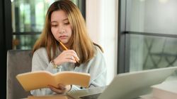 Female doing checking her notes