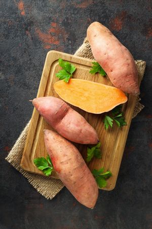 Concept of vegetables, sweet potato, top view