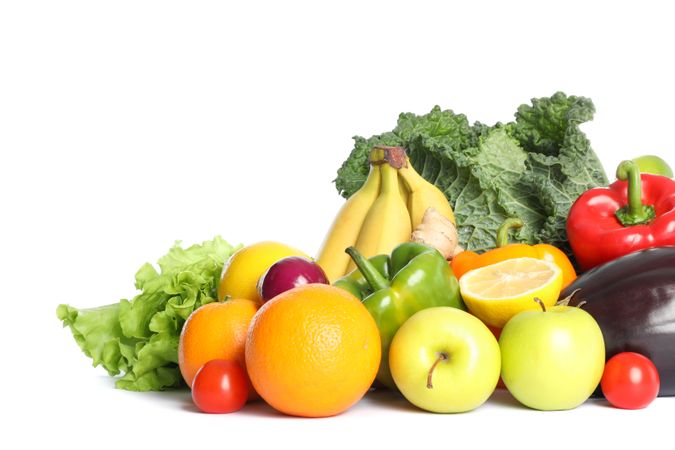 Composition with fresh vegetables and fruits isolated on blank background