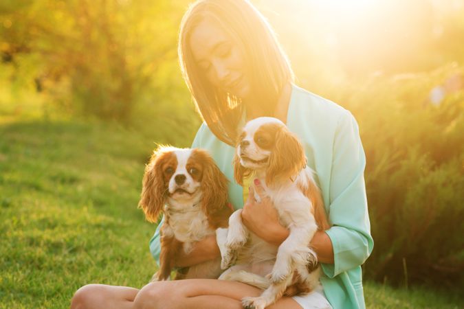 Breeder on walk with two dogs