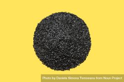Pile of sunflower seeds isolated on a yellow background 4ZZdn4