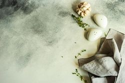 Salt and pepper shakers on marble background with space for text
