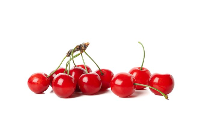 Fresh red cherry isolated on plain background