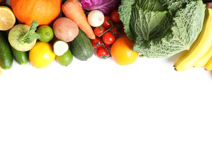 Composition with ripe vegetables and fruits isolated. Top view