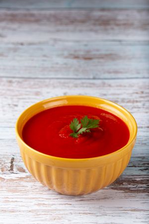 Delicious homemade tomato soup in bowl.