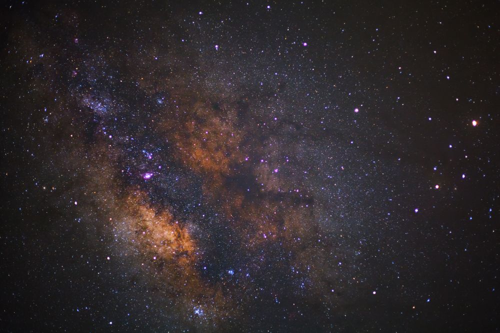 Milky way galaxy with stars and space dust in the universe, Long exposure photograph, with grain.
