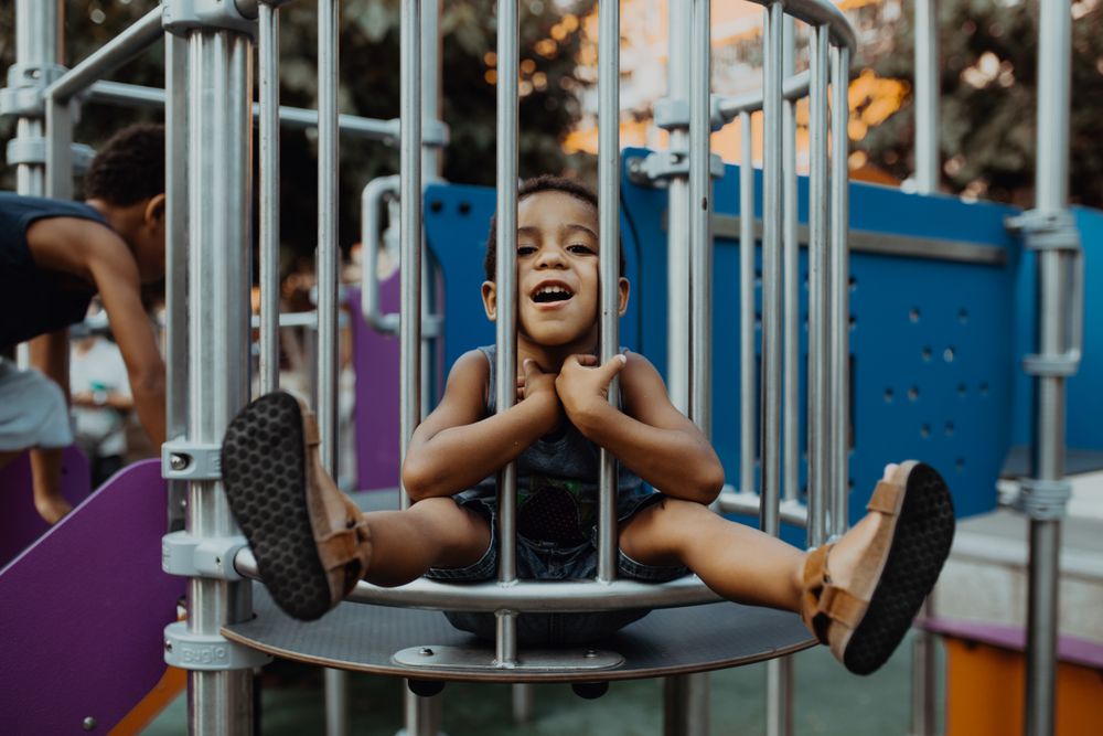Funny Black boy on playground
