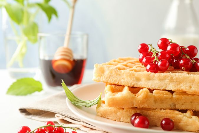 Beautiful composition with sweet belgian waffles, space for text