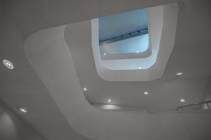 Amazing modern hall interior with white stairway