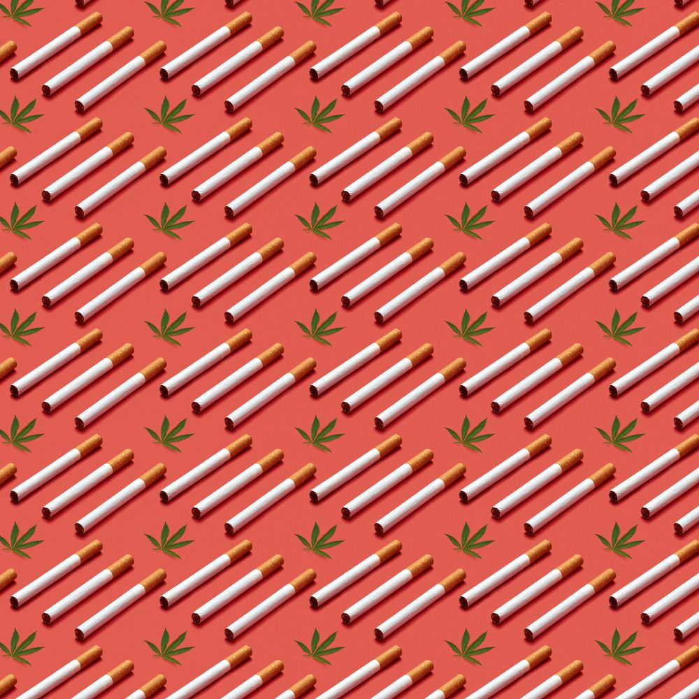 Pattern of cigarettes and cannabis leaves