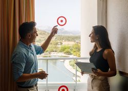 Safety inspectors checking stickers on hotel window