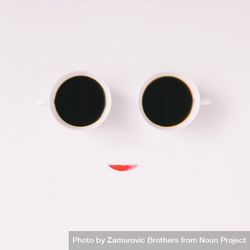 Face made of two coffee cups and pink flower petal on light background 5zwln4