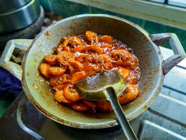 Spicy Sweet and Sour Shrimp Cooking in Wok