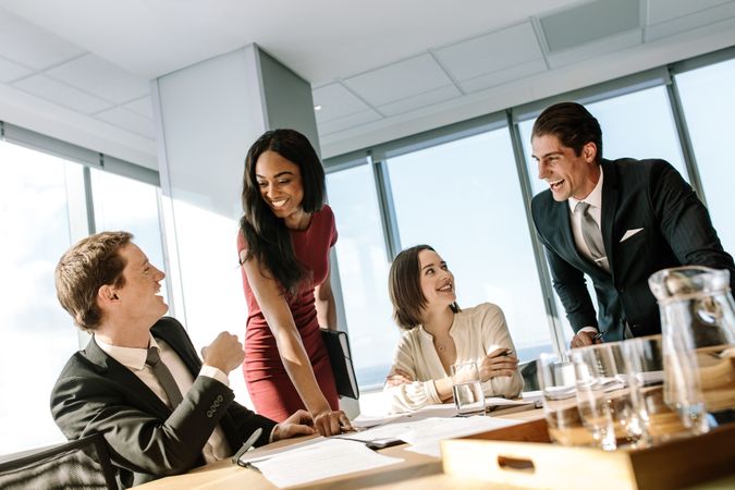 Diverse business people smiling during a meeting
