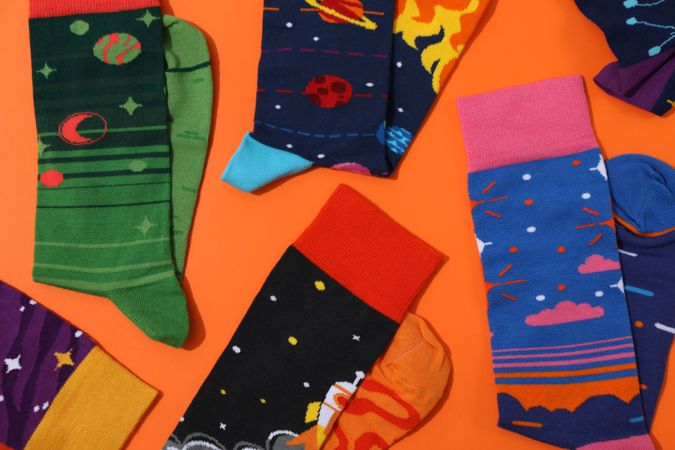 Casual clothes and wearing concept - socks, clothes for foot