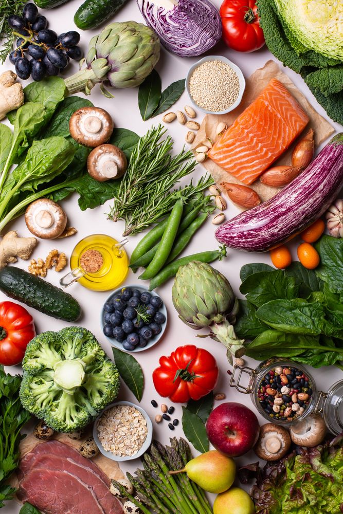 Flat lay of fresh vegetables, fruit and fish