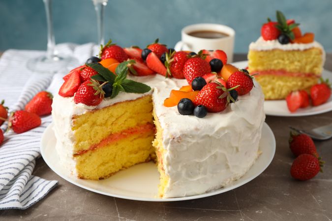 Composition with delicious berry cream cake. Tasty dessert