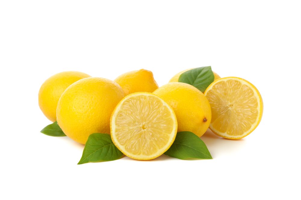 Fresh lemons isolated on light background. Ripe fruit