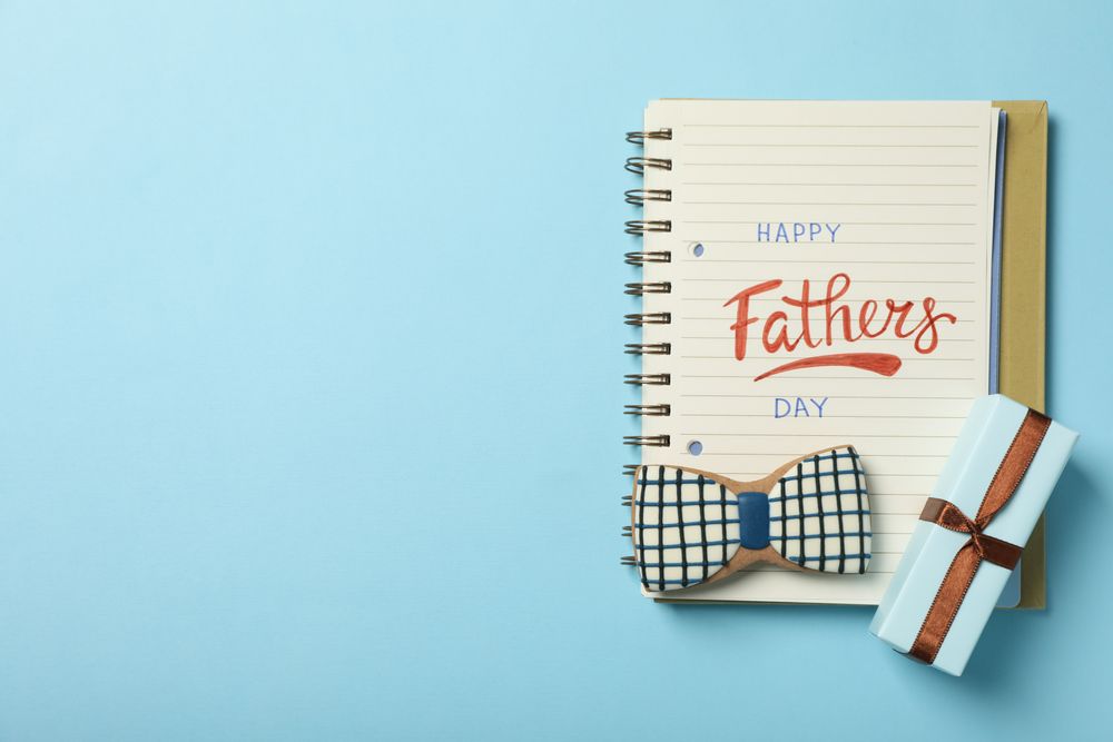 Happy father's day inscription, inscription in notebook, with gifts.