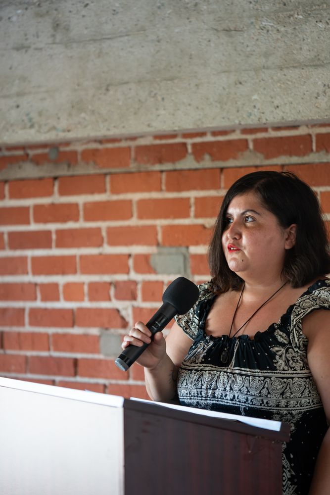 Woman at podium with microphone