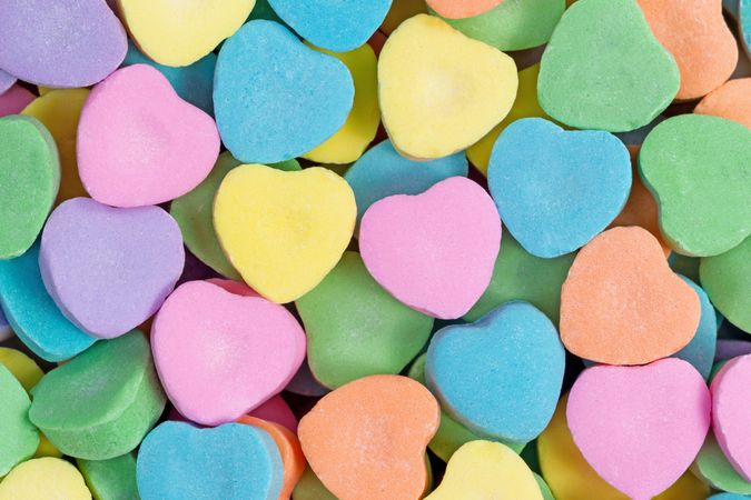 Happy Valentines day with heart shaped candies