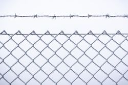 Wire fence frost-covered