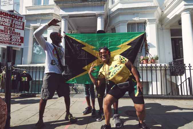 London, England, United Kingdom - August 25th, 2019: Carnival revelers with Jamaican flag