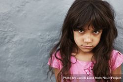 Close up portrait of young girl with serious expression 5a3z8b