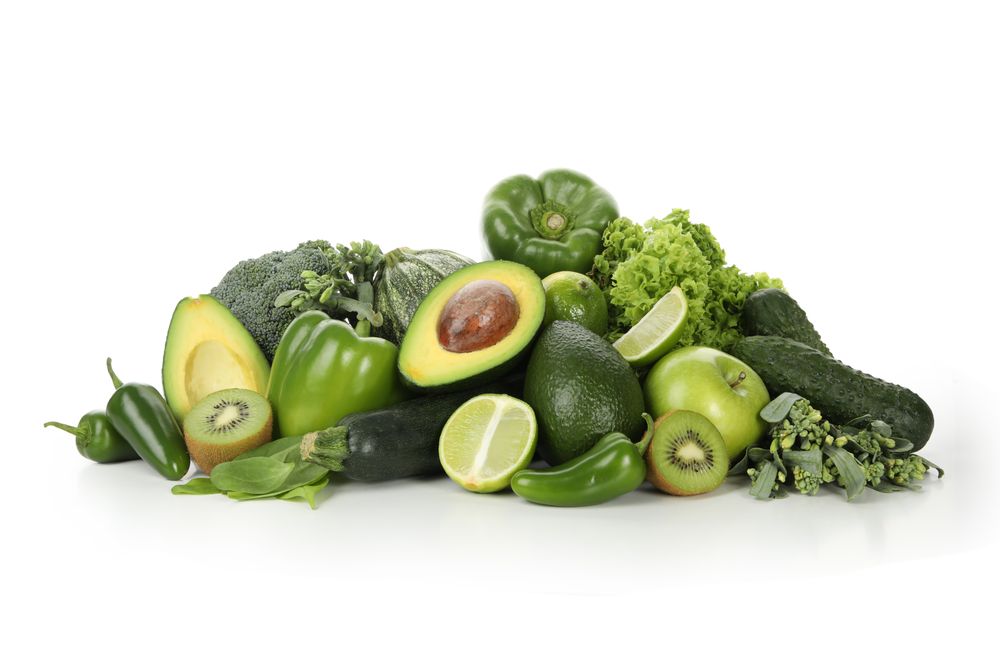 Bunch of green vegetables isolated on blank background