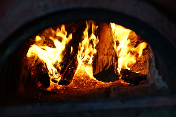 Burning fireplace with logs