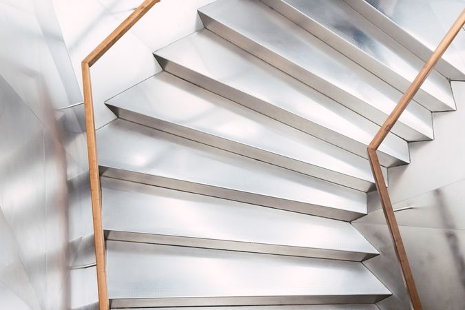 Staircase with railings in corridor