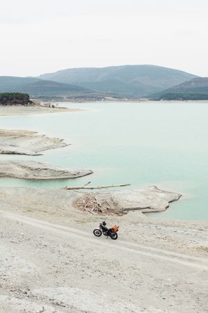 Motorcycle near calm lake