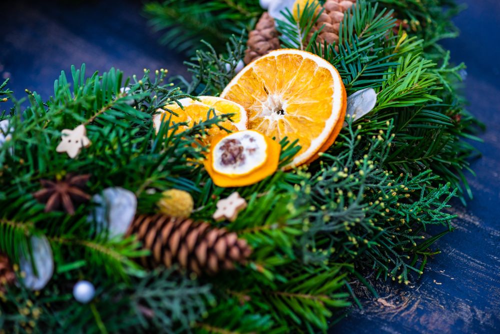 Close up of Christmas wreath with star anise and dried orange slices