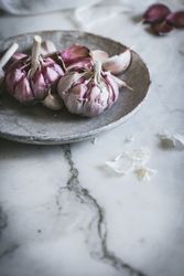 Close-up of a plate of garlic