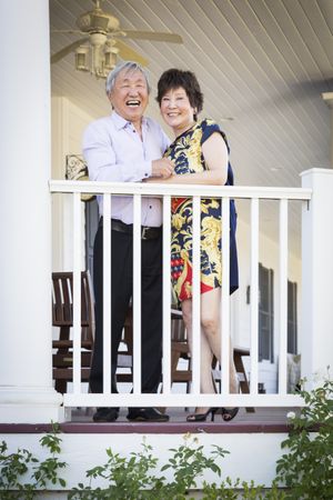 Chinese Couple Enjoying Their House