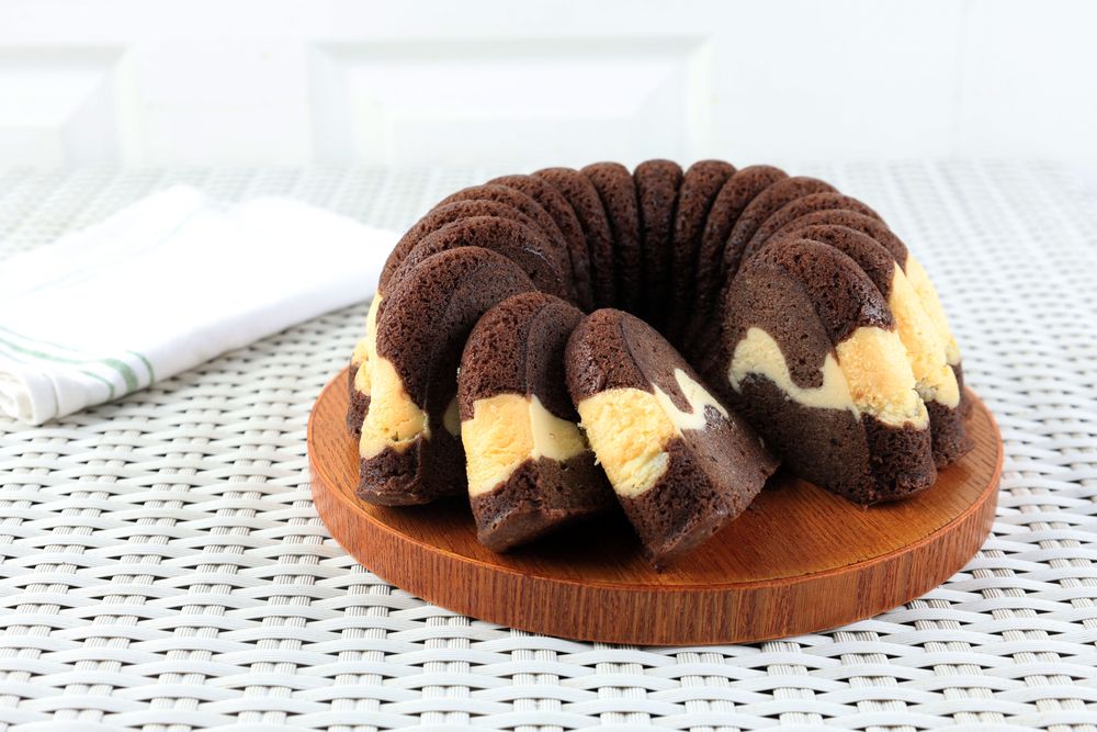 Brownie Bundt Cake with Cream Cheese on Table